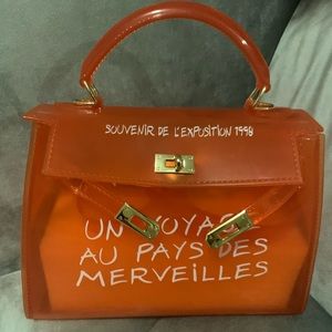 Clear Orange medium size bag with gold hardware